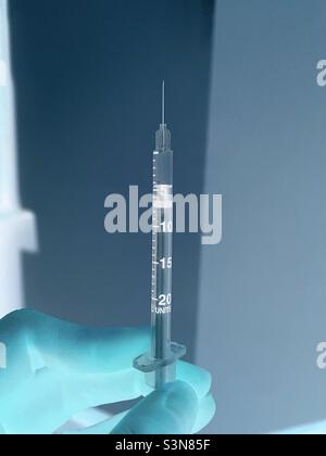 Insulin syringe for veterinary use in diabetic cats and dogs , inverted colors, shot, injection, vaccine, medicine, needle Stock Photo