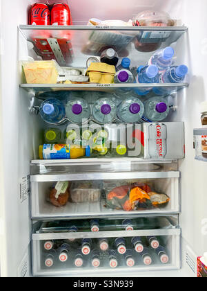Inside a well stocked fridge Stock Photo