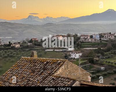 Sunset view from Spinetoli, Marche region, over the Gran Sasso d’Italia, Great Rock of Italy, Abruzzo region, massif in the Apennine Mountains Stock Photo