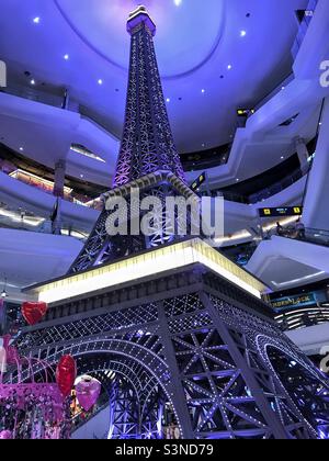 Replica of the iconic Eiffel Tower at Terminal 21 Shopping Mall in Pattaya Thailand Southeast Asia. The mall is a City themed center over several floors with this being the Paris floor. Stock Photo