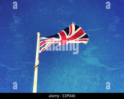 The flag of the United Kingdom is known as The Union Jack. A creative image with a textured effect - possibly a comment on the state of the UK after Brexit? Photo ©️ COLIN HOSKINS. Stock Photo