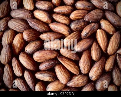 Full frame of roasted and salted almonds Stock Photo
