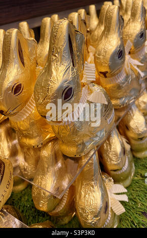 Gold foil wrapped Easter bunny display for sale in a retail outlet, 2022, USA Stock Photo
