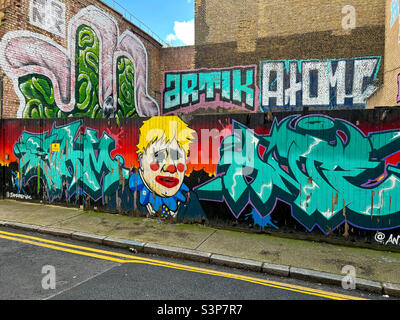 Graffiti art of Boris Johnson Shoreditch, London March 2022