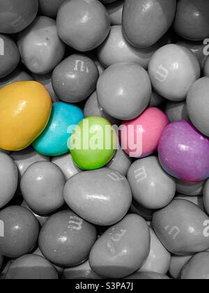 Select color(s) M&M chocolate-covered peanut candies, colored in pastels especially for Easter. Stock Photo