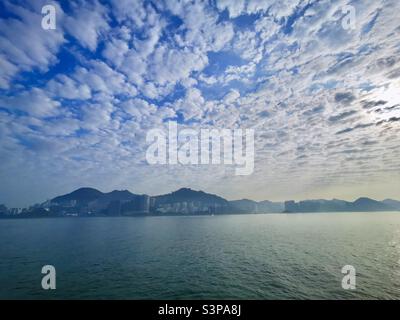 A view of Hong Kong island seen from Lamma island in Hong Kong. Stock Photo