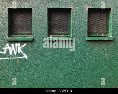 Three windows with security grille Stock Photo