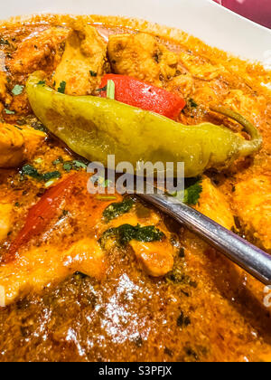 Chicken and chilli Balti curry Stock Photo