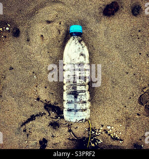 plastic bottle polution on the beach Stock Photo