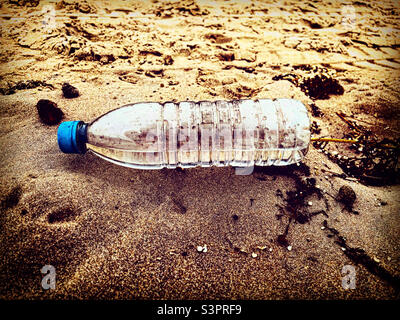 pollution in the sea with this waste plastic water bottle Stock Photo