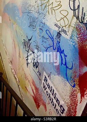 Interior Graffiti Wall with Pink Black Yellow and Blue Stock Photo