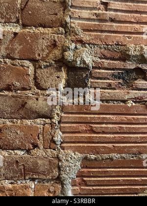 Textured Red Brick Wall Stock Photo