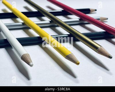 Colored pencils on piled up Stock Photo