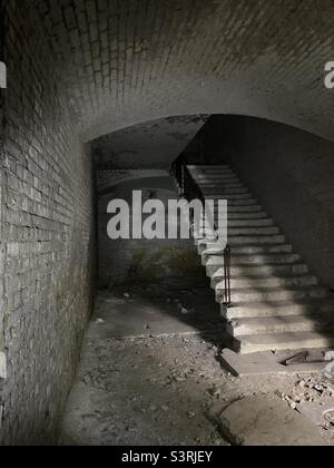 1860’s staircase in an abandoned military site Stock Photo