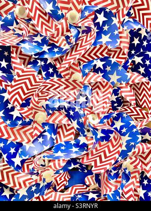 Colorful Red, White and Blue, Stars and Stripes pinwheels for sale at a local Utah, USA Walmart just prior to the Memorial Day holiday. Stock Photo