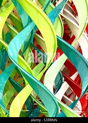 Plastic twirls, red, yellow and green Stock Photo