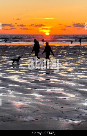 Perranporth beach in Cornwall at sunset. Stock Photo