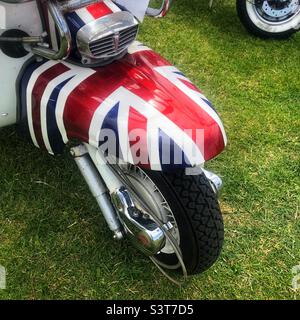 Rocker at show standing in front of british bikes Stock Photo - Alamy
