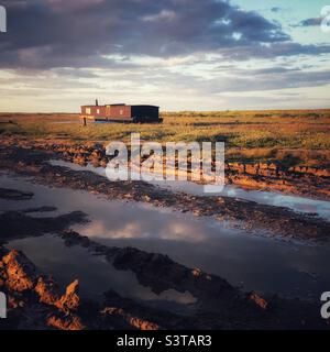 Houseboat at Brancaster Staithe in Norfolk Stock Photo
