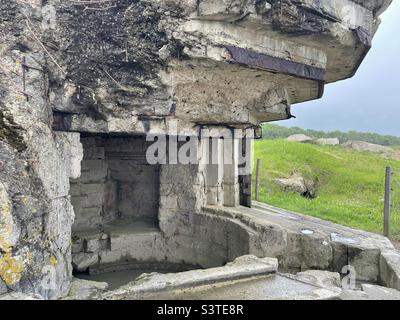 WWII German bunker above Omaha Beach, Normandy, France Stock Photo