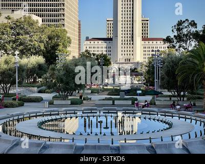 LOS ANGELES, CA, OCT 2021: fountain in Grand Park switched off for maintenance, with City Hall in background, Downtown, day time Stock Photo