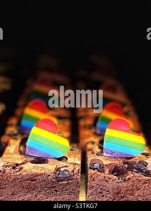 Pride 22 Brownies decorated with a rainbow-coloured heart, as seen in a bakery in Soho London Stock Photo