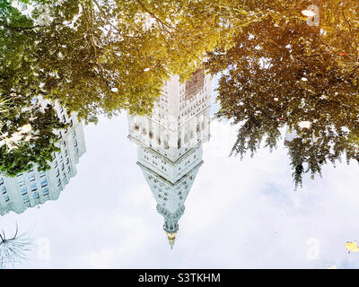 Reflections of the Metropolitan Life Tower in the fountain pond in Madison Square Park, flatiron District, 2022, New York City, USA Stock Photo