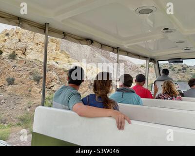 Shuttle at the Dinosaur National Monument in Vernal, Utah, USA transports visitors from the Visitor Center a short distance uphill to the quarry, or excavation, where the fossils and bones await. Stock Photo