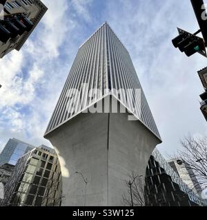 SEATTLE, WA, DEC 2021: looking up at Rainier Tower, a 41-storey skyscraper with a distinctive tapered base, designed by architect Minoru Yamasaki and located in Downtown Stock Photo