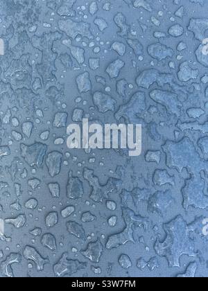 Abstract background of water droplets on blue background Stock Photo