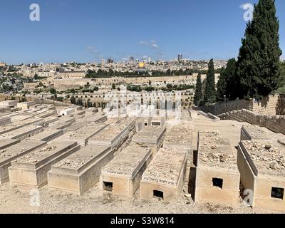 View over Jerusalem from Mount of Olives, Jewish Cemetery and Dome of the Rock Stock Photo