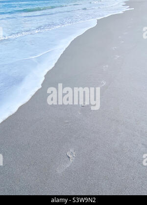 Footprints in sand Stock Photo