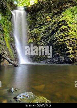 Sgwd Einion Gam, the waterfall of the crooked anvil on the river Pyrddin, South Wales. Stock Photo