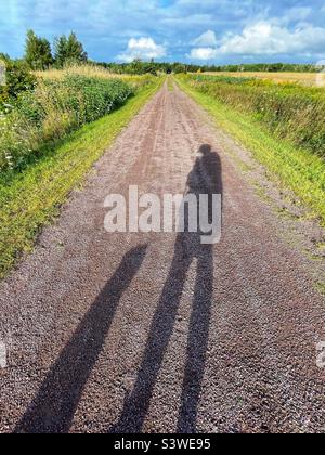 Woman with her dog on the trail. Stock Photo