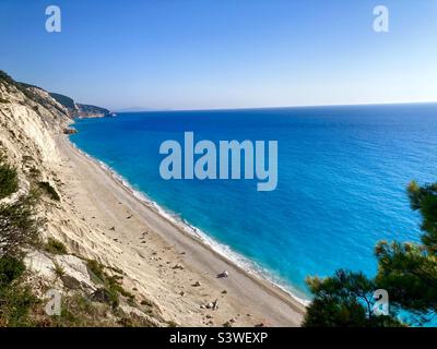 view of the long sandy beach of Egremni with the enchanting turquoise sea on the island of Lefkada Stock Photo