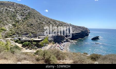 Beach and La Cala restaurant at Cala del barco in La Manga Resort in Murcia Spain Stock Photo