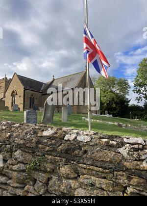 Middle Chinnock church flag at half mast in respect of Queen Elizabeth II death Stock Photo