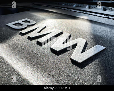 BMW logo on engine block of X4 M40i Stock Photo