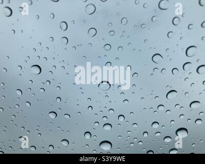 Rain on car window on a cloudy day Stock Photo