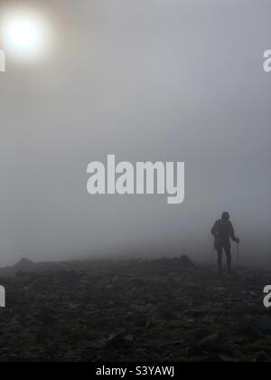 HillWalking on a foggy mountain in the Scottish Highlands, Scotland Stock Photo