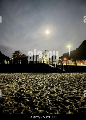 Full moon, Camps Bay tidal pool, Cape Town, South Africa Stock Photo