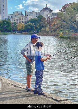 Painterly effect on a photo of a father & son fishing Stock Photo