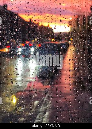Sunset in a wet city centre Stock Photo