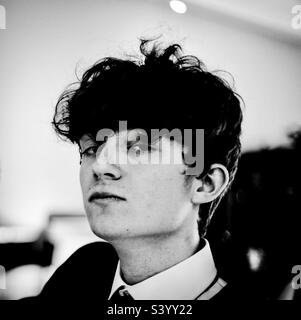 Young man looking confident in black and white. Stock Photo