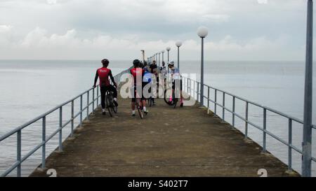 cyclist on the Tanjung Sepat Lover’s bridge Stock Photo