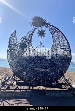 The Treadgold fish sculpture at Southsea, Portsmouth, UK. Used for collecting empty plastic bottles for recycling. Made from scrap metal. Stock Photo