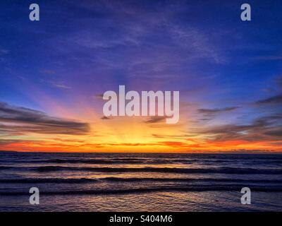 Sunset over the sea in Bali Stock Photo