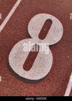 The number eight on red track position for track and field sports Stock Photo