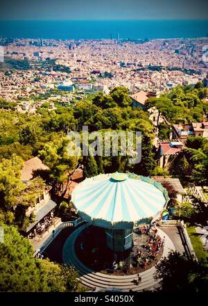 A view from Tibidabo Amusement Park, looking out across Barcelona towards the sea Stock Photo