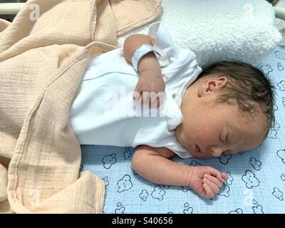 one day old baby sleeping. late preterm infant Stock Photo